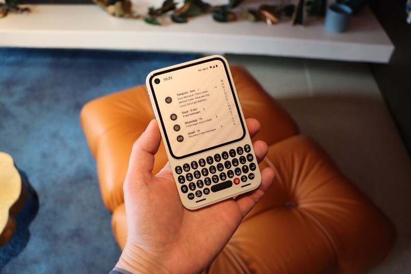 Clicks Communicator In Hand Orange Cushion