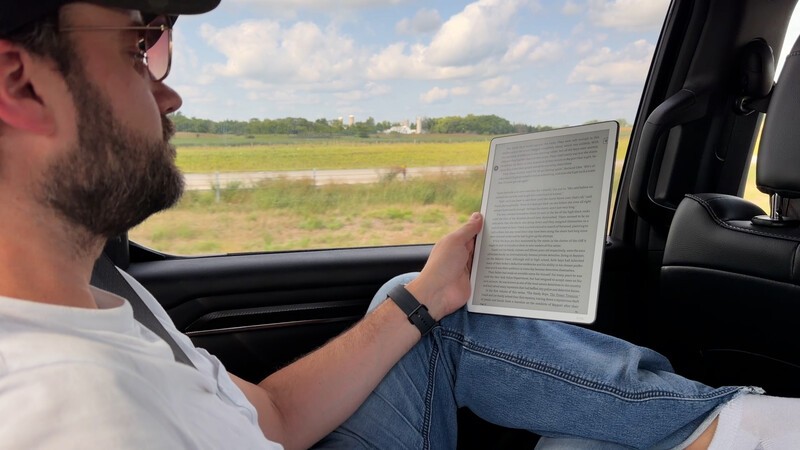Kindle Scribe Reading In Car Medium Shot